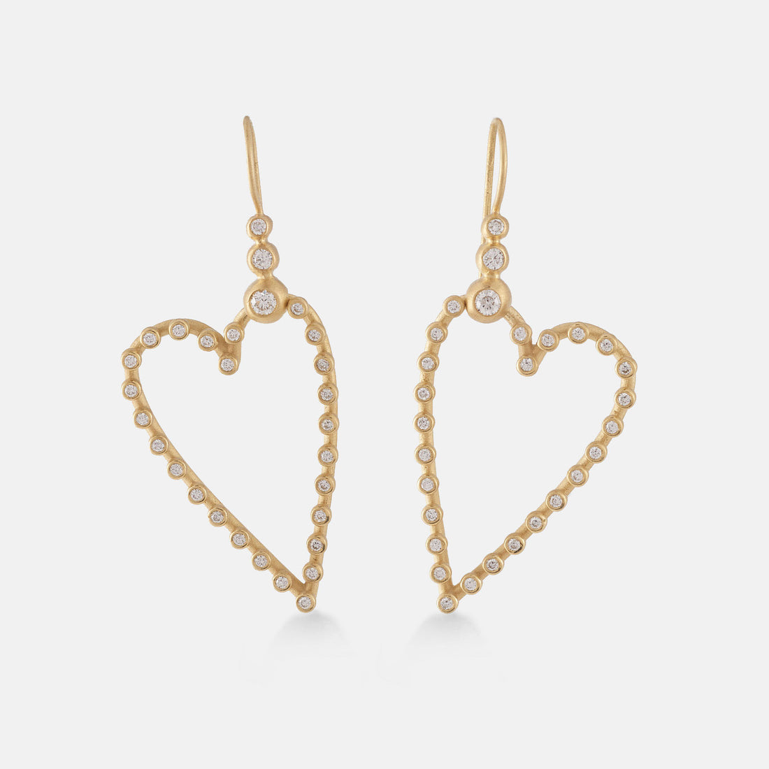 Front facing elongated heart shaped diamond studded earrings