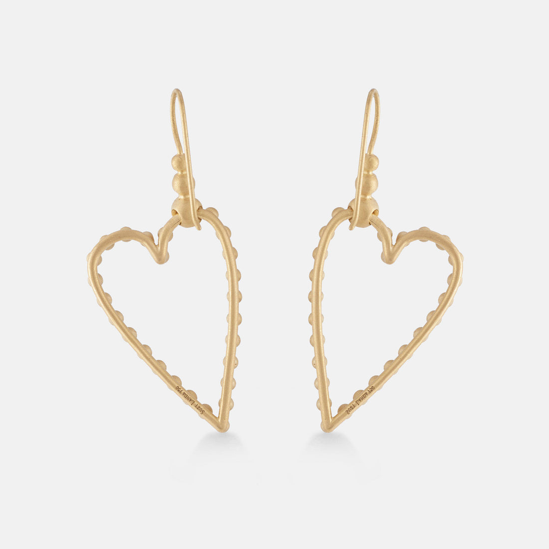 Front facing elongated heart shaped diamond studded earrings